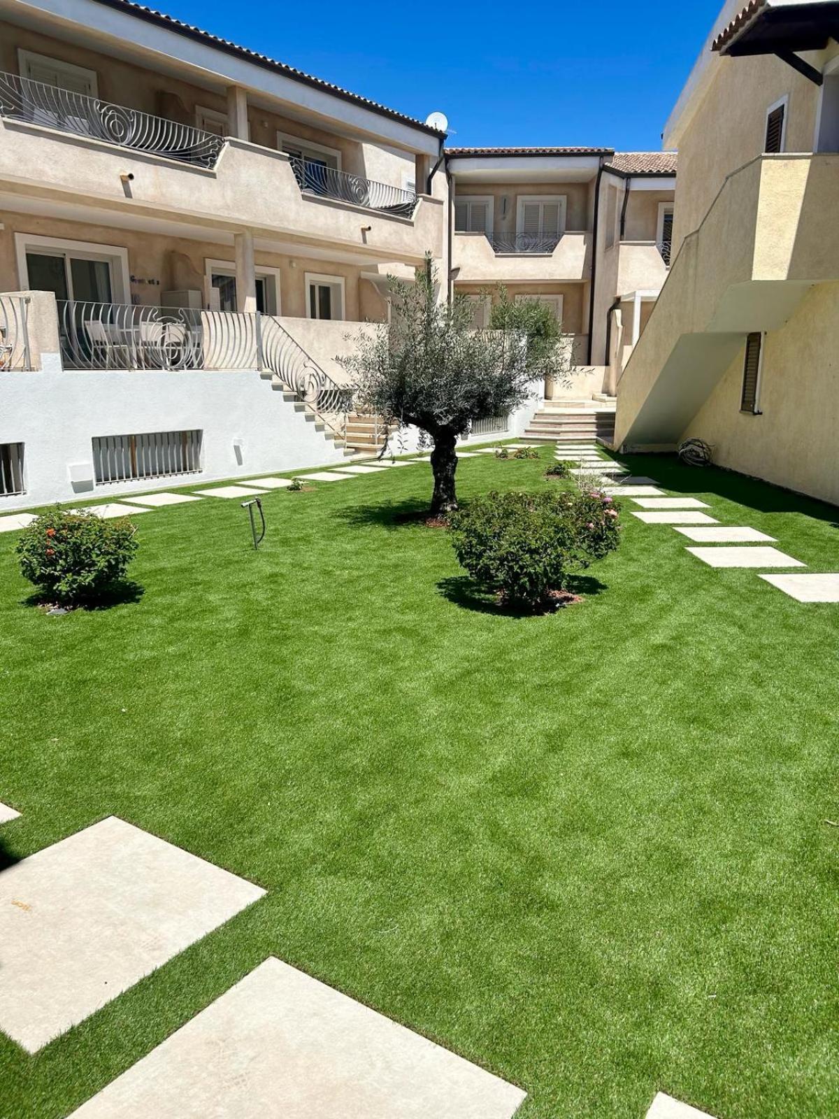 Appartamento Incantevole Con Piscina Palau Luaran gambar